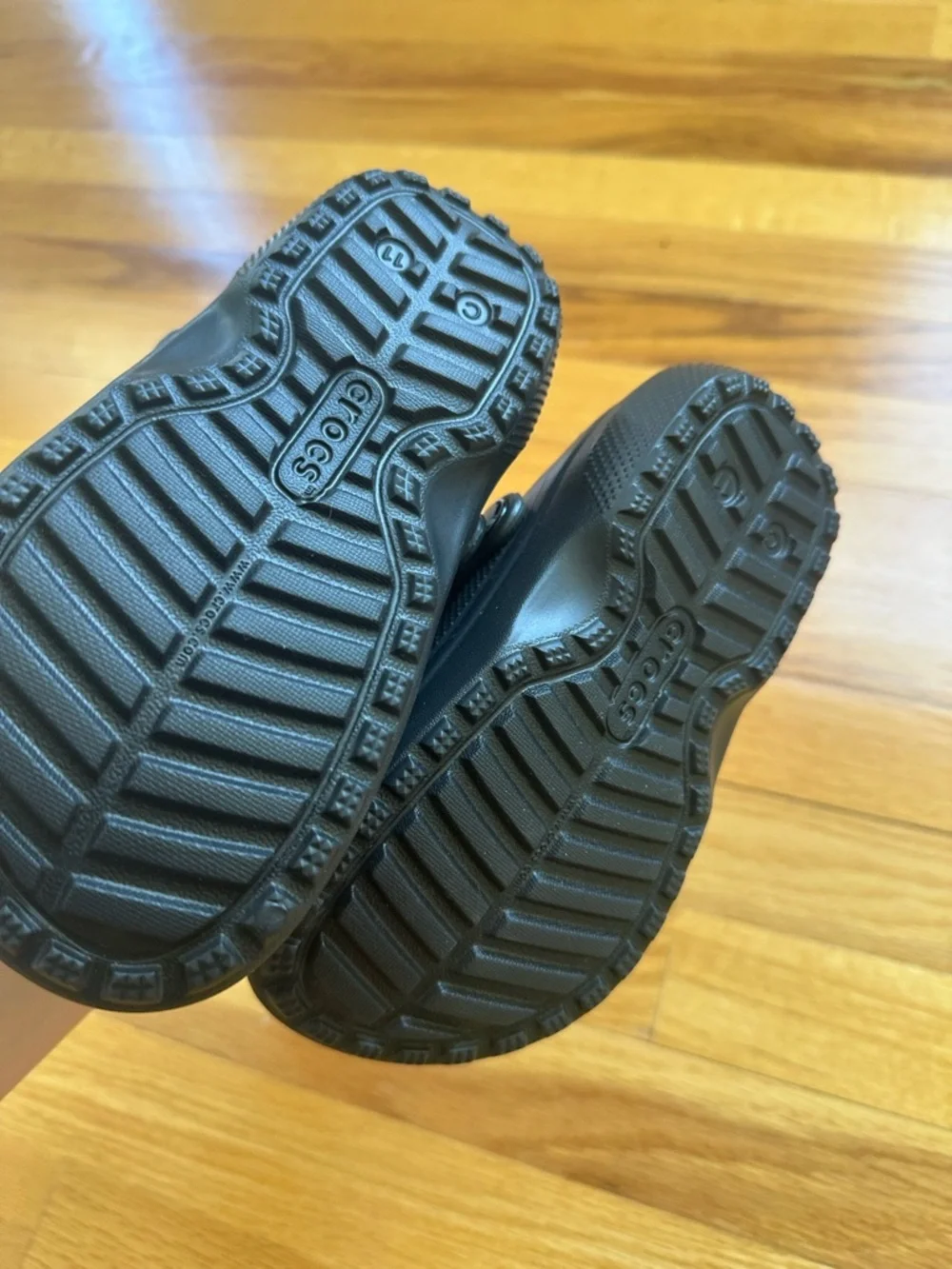 CROCS Kids Black Fuzzy-Lined Clogs